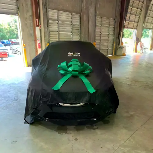 Ready for the unveiling at an NABC Recycled Rides giveaway event.